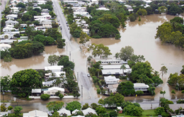 Heavy rains dampen fires in Australia’s Queensland state, cause flooding